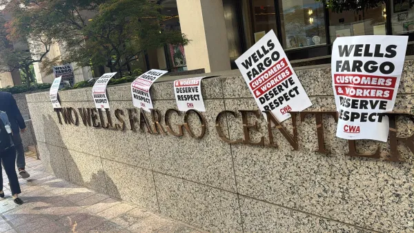 CWA Signs across Front of Well's Fargo building